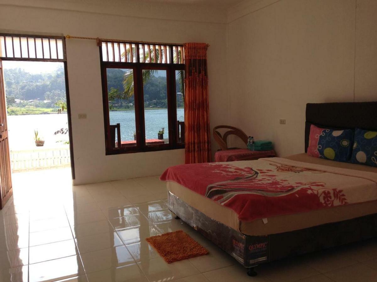 Aman'S Guesthouse Tuktuk Siadong Bagian luar foto